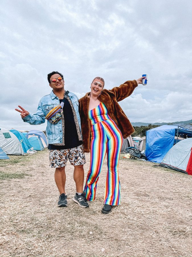 Zoe and Tyler at a music festival campsite